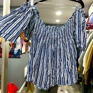 Woman’s Over-the-Shoulder Striped Blouse